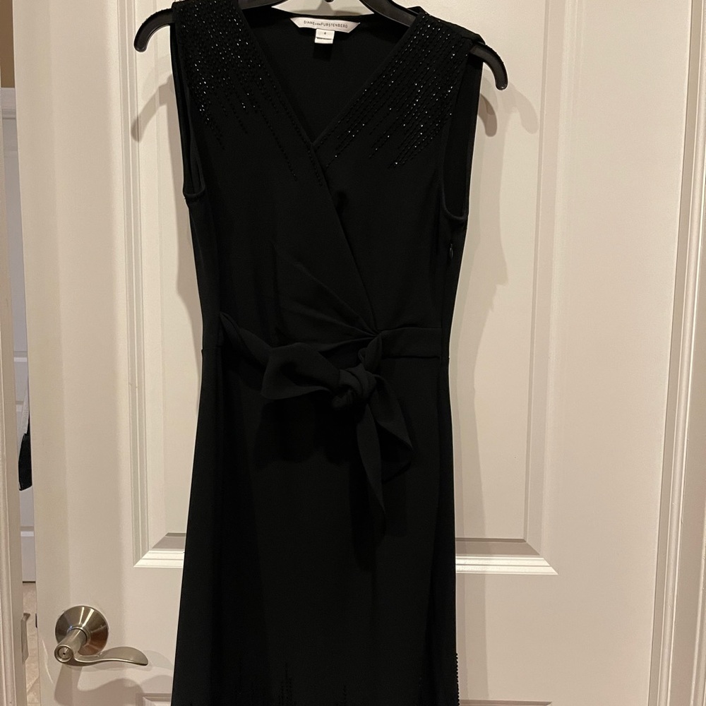 NEW Diane Von Furstenberg dress with black beads around the neck and the hem
